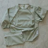 New Long-sleeved Bib with integrated pocket 6-24m - Sage Kids Bibs|Breastfeeding